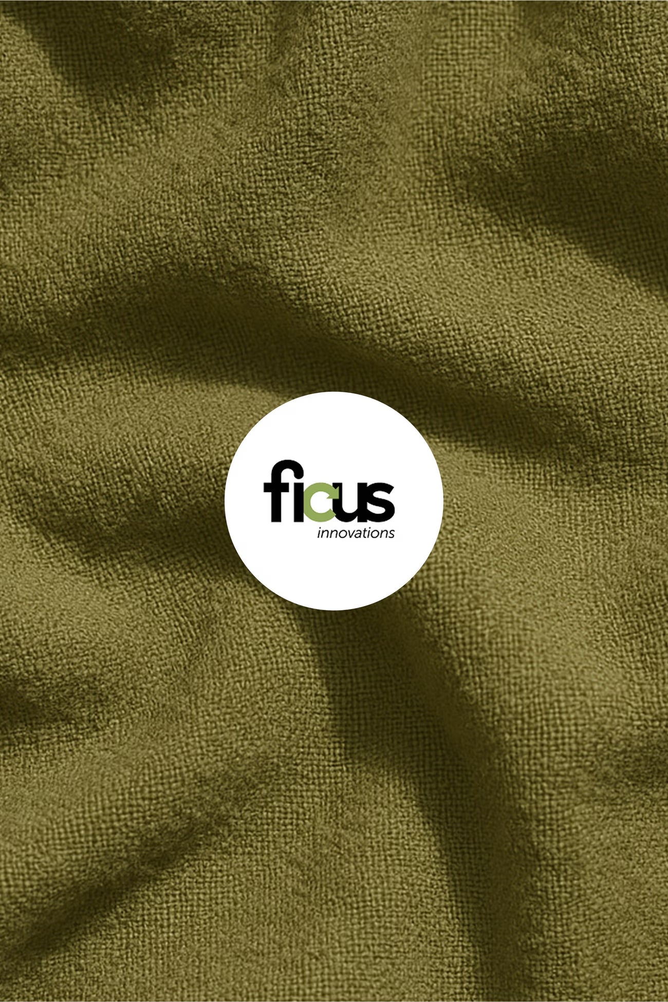 Close-up of green fabric with 'ficus innovations' logo in the center.
